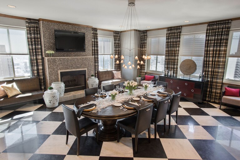 Ross Sterling  Dining Room with vintage black and white tile floor 